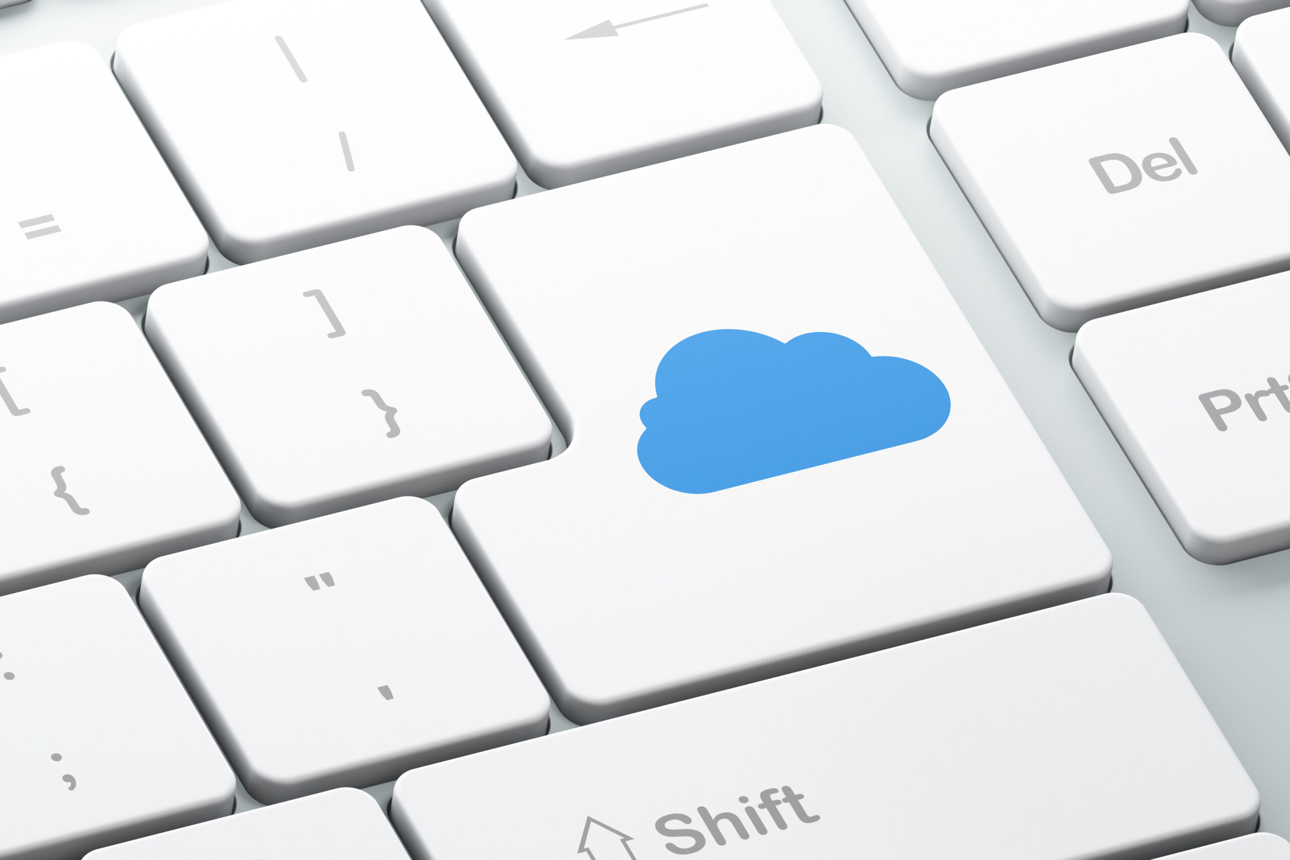 Composite-Bild einer Computer-Tastatur, die Enter-Taste mit einem Cloud-Symbol
